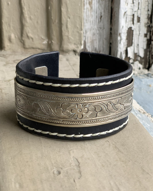 Black Leather Cuff with Intricate Metal Engraving